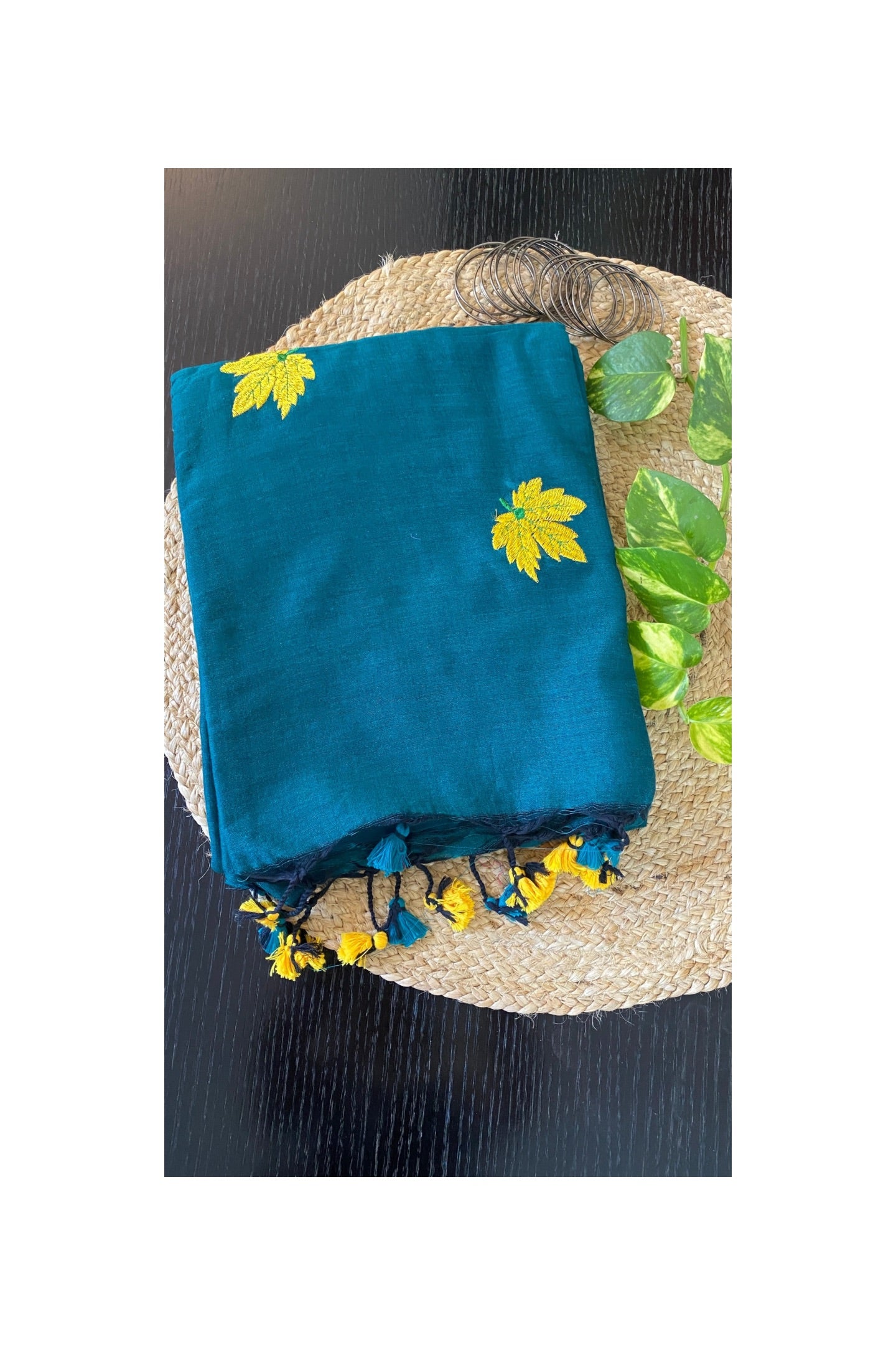 Green embroidered mull cotton saree